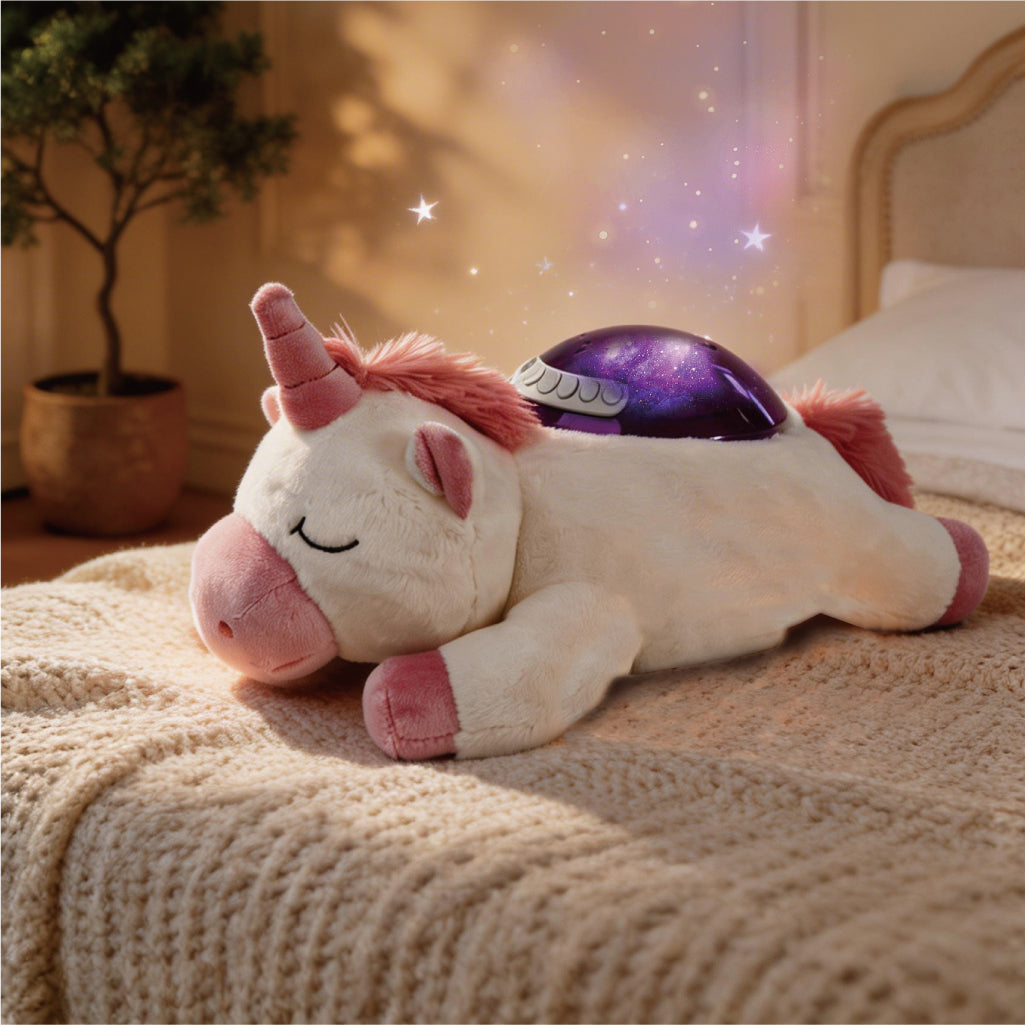 Unicorn-shaped night light on a bed with a cozy bedroom setting